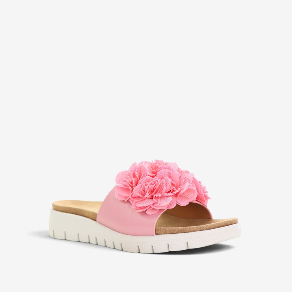 CC Resorts Domo Baby Pink slip-on shoes for kids, featuring soft fabric and playful design, perfect for casual wear.