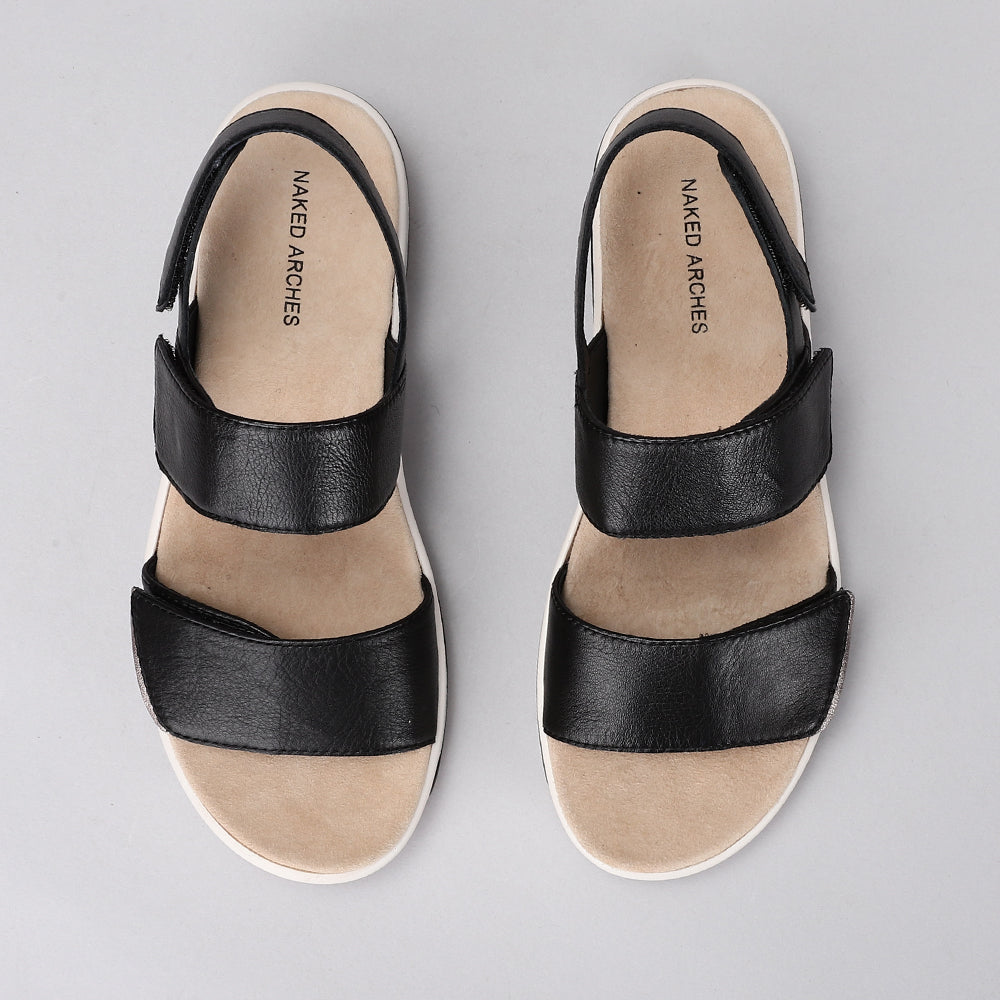 Naked Arches Hanza Black sandals with cushioned footbed and adjustable straps, stylish and comfortable for everyday wear.
