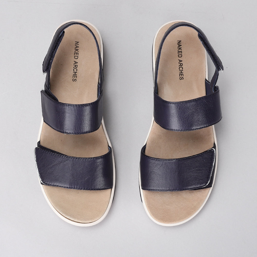 Naked Arches Hanza Navy sandals with navy straps and cushioned footbed, designed for comfort and casual style.