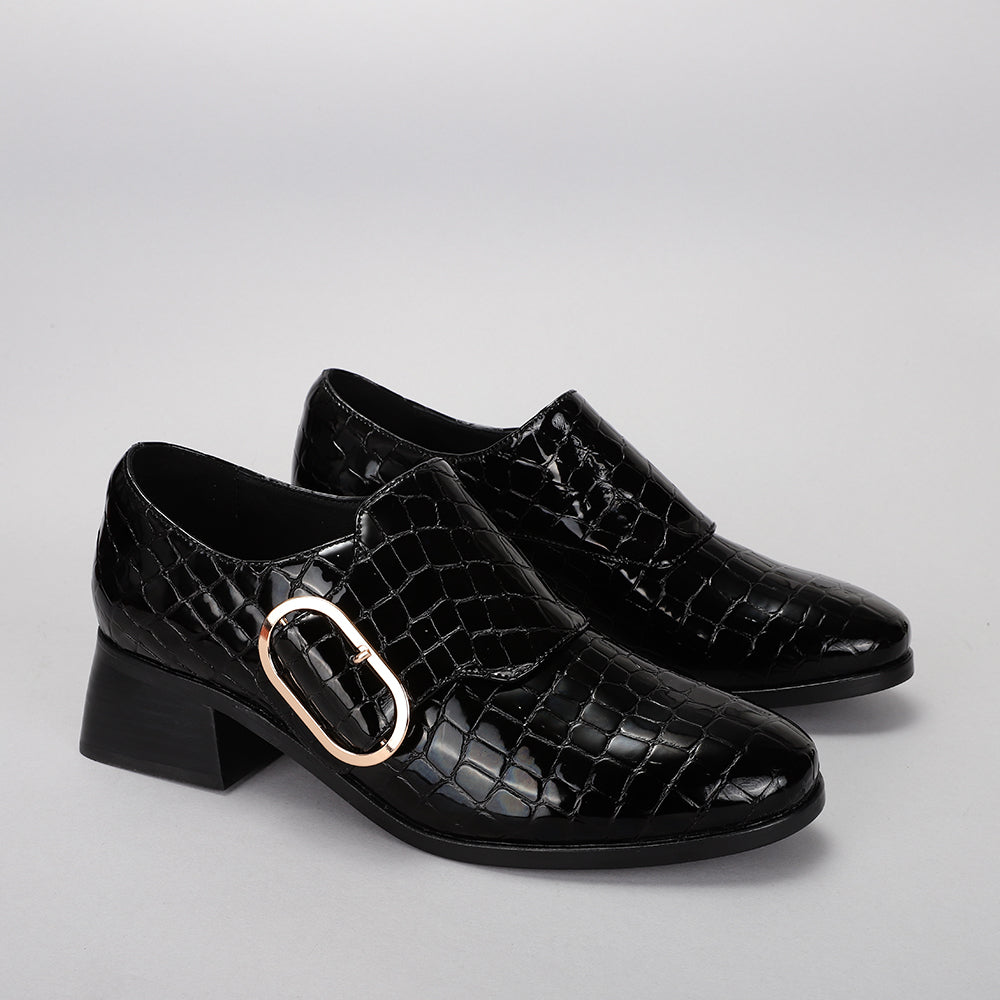 Le Sansa Rice Black Print loafers featuring a stylish black print design, shown from a 3/4 view.