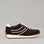 Naked Arches Wednesday Chocolate sneakers in brown with white soles, showcasing stylish casual footwear for everyday wear.