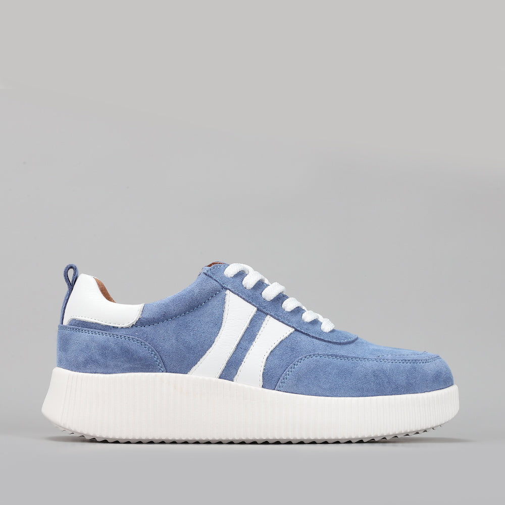 Le Sansa Comet Blue Suede sneakers showing blue suede material and stylish design on clean white background.