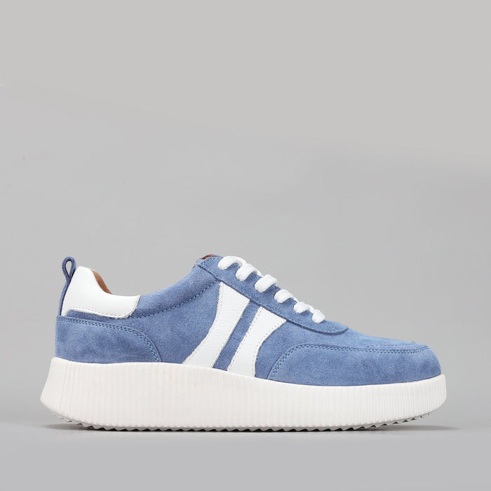 Le Sansa Comet Blue Suede sneakers showing blue suede material and stylish design on clean white background.