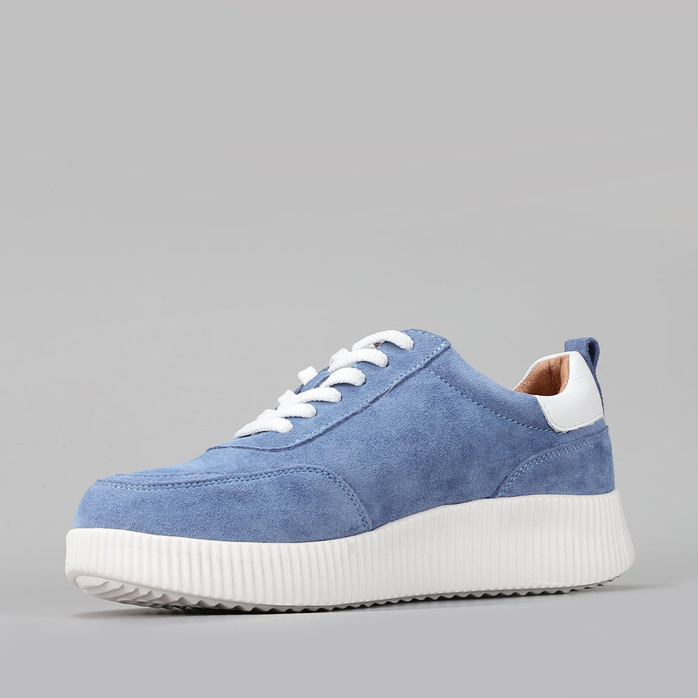 Le Sansa Comet Blue suede sneakers with white rubber soles and laces, showcasing a stylish casual footwear design.