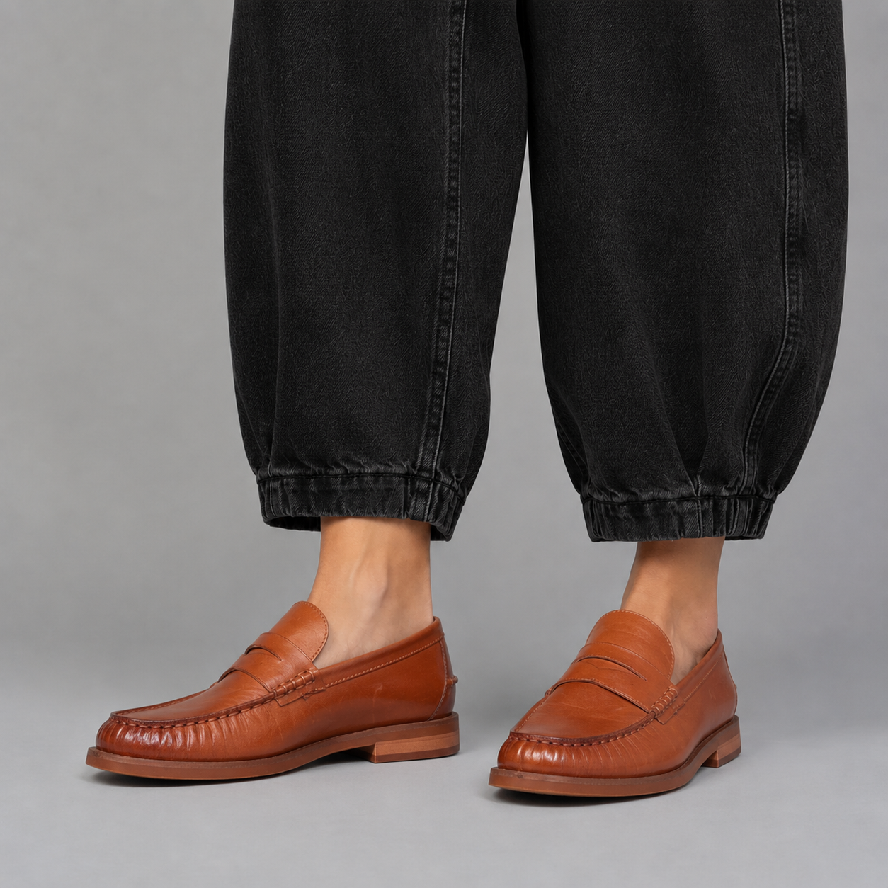 Black EOS Forte Brandry loafers with sleek design and leather finish, ideal for casual or smart occasions.