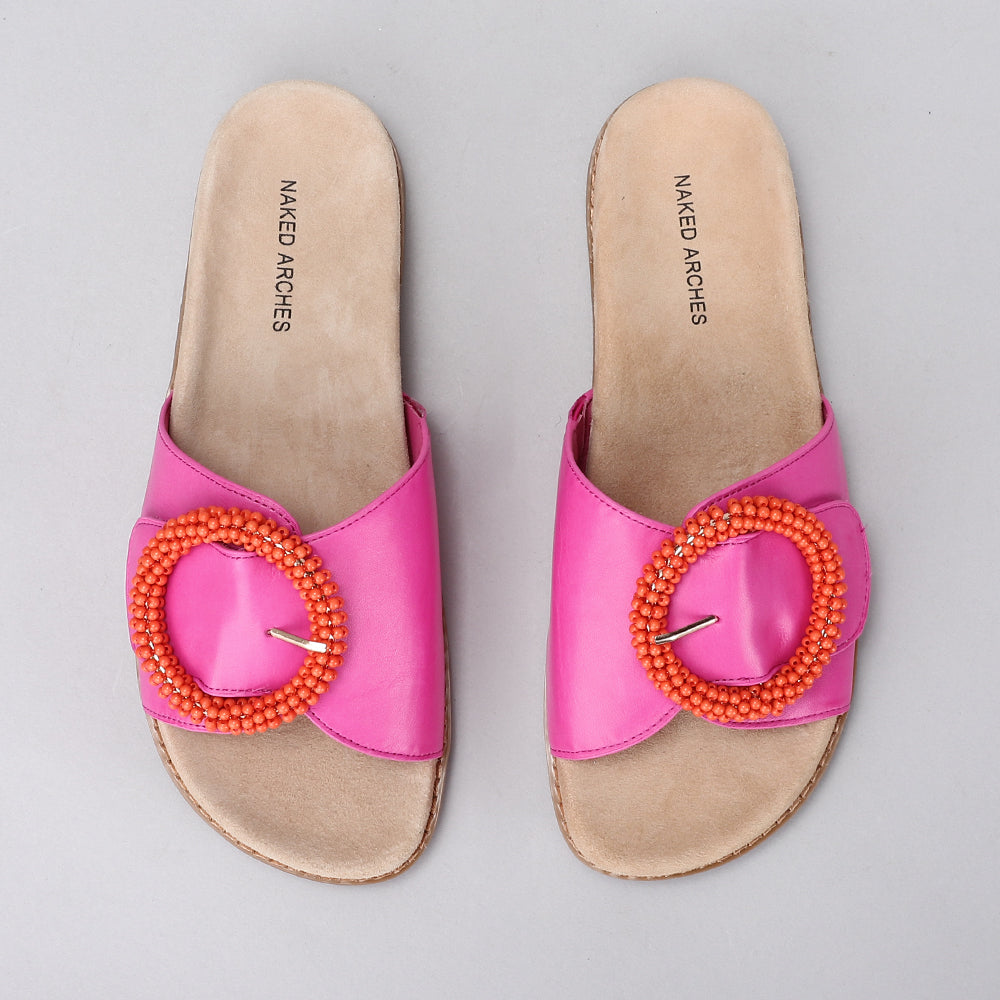 Naked Arches Zoya hot pink slip-ons with sleek design and comfortable fit, perfect for casual and everyday wear.