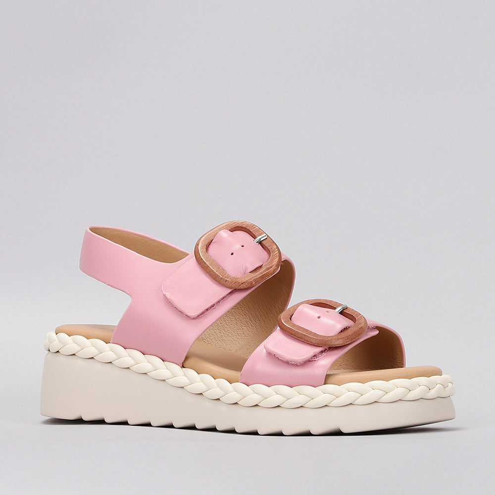 Le Sansa Emery baby pink sandals featuring soft straps and a comfortable sole, perfect for little feet.