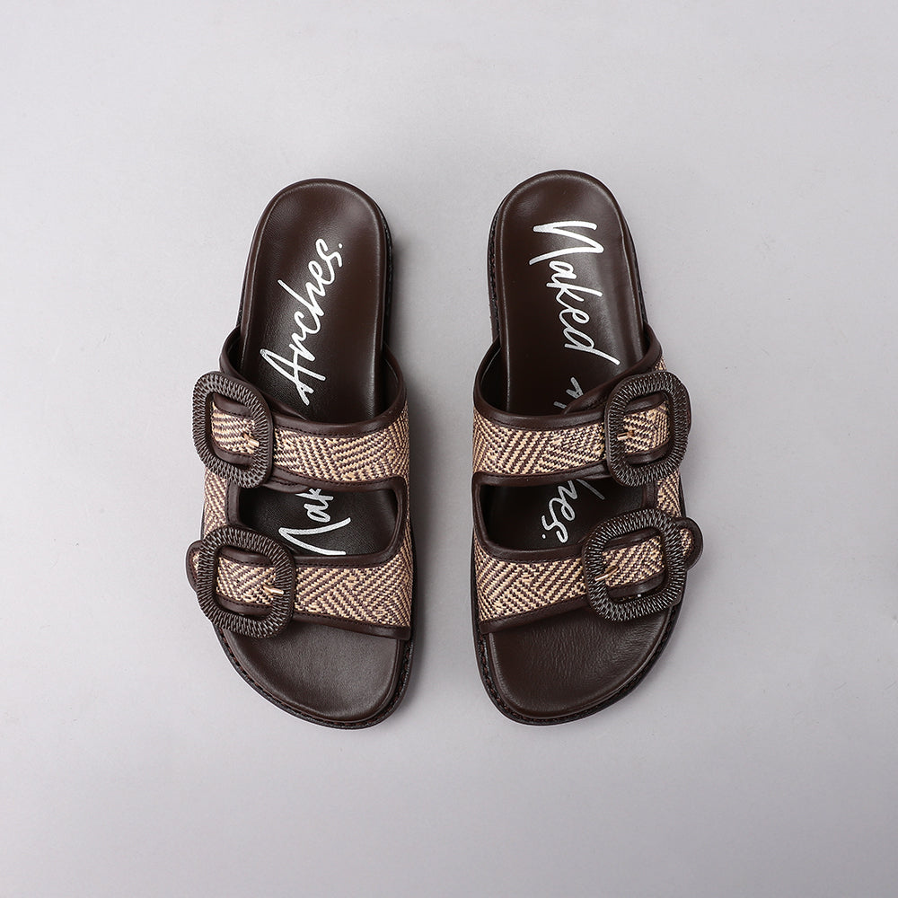 Naked Arches Harriet chocolate flats with rounded toe and slip-on design, featuring soft leather material and subtle stitching details.