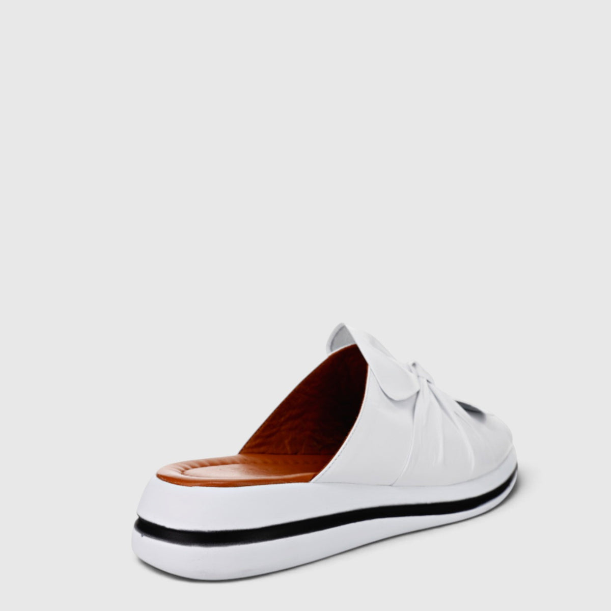 Le Sansa White flats with sleek design and comfortable fit, featuring a smooth white leather upper and stylish low heel.