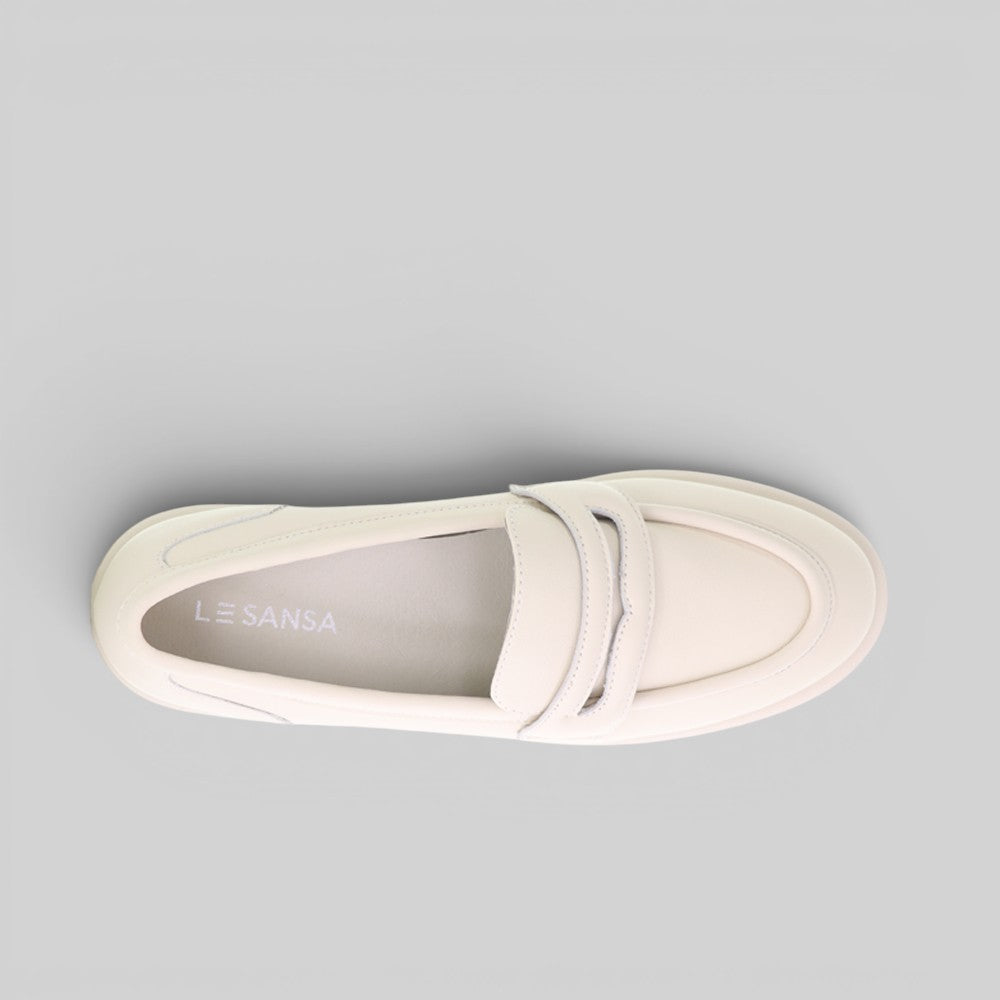 LE SANSA nude leather loafers with sleek design and stitching, displayed on a neutral background.