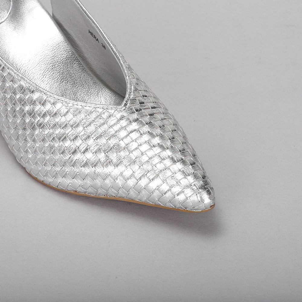 Silver Naked Arches Hera sandals with adjustable straps and cushioned footbed, displayed on a neutral background.