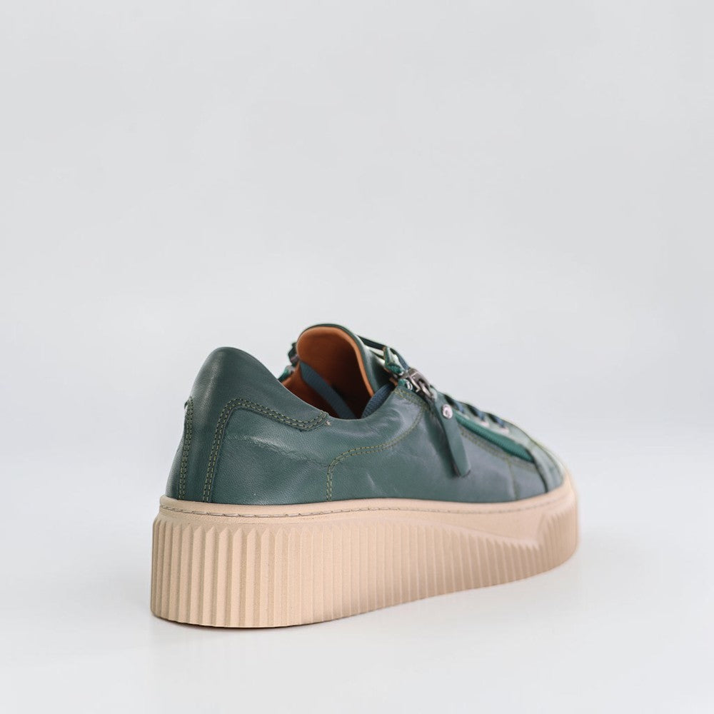 Le Sansa Palmer Olive sneakers with green fabric and white sole, casual footwear style, detailed close-up image.