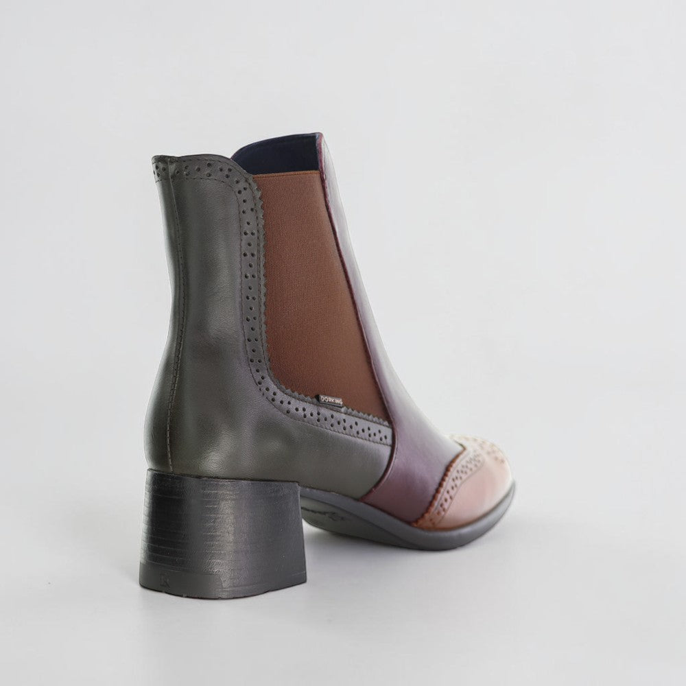 Dorking Ikia Bosque leather ankle boots with lace-up design and low heel, in brown, displayed on a neutral background.