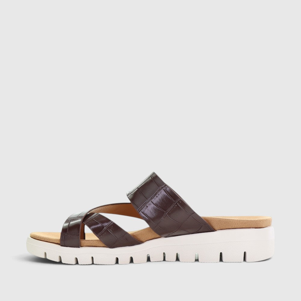CC Resorts Domino Chocolate Crocs slip-on shoes with textured design and comfortable fit, casual footwear for everyday wear.
