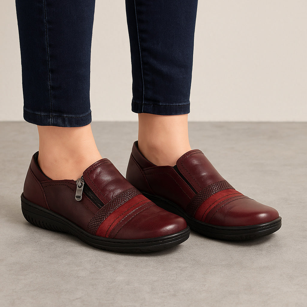 CABELLO dark burgundy boots with sleek leather design and pointed toe, stylish footwear for modern fashion.
