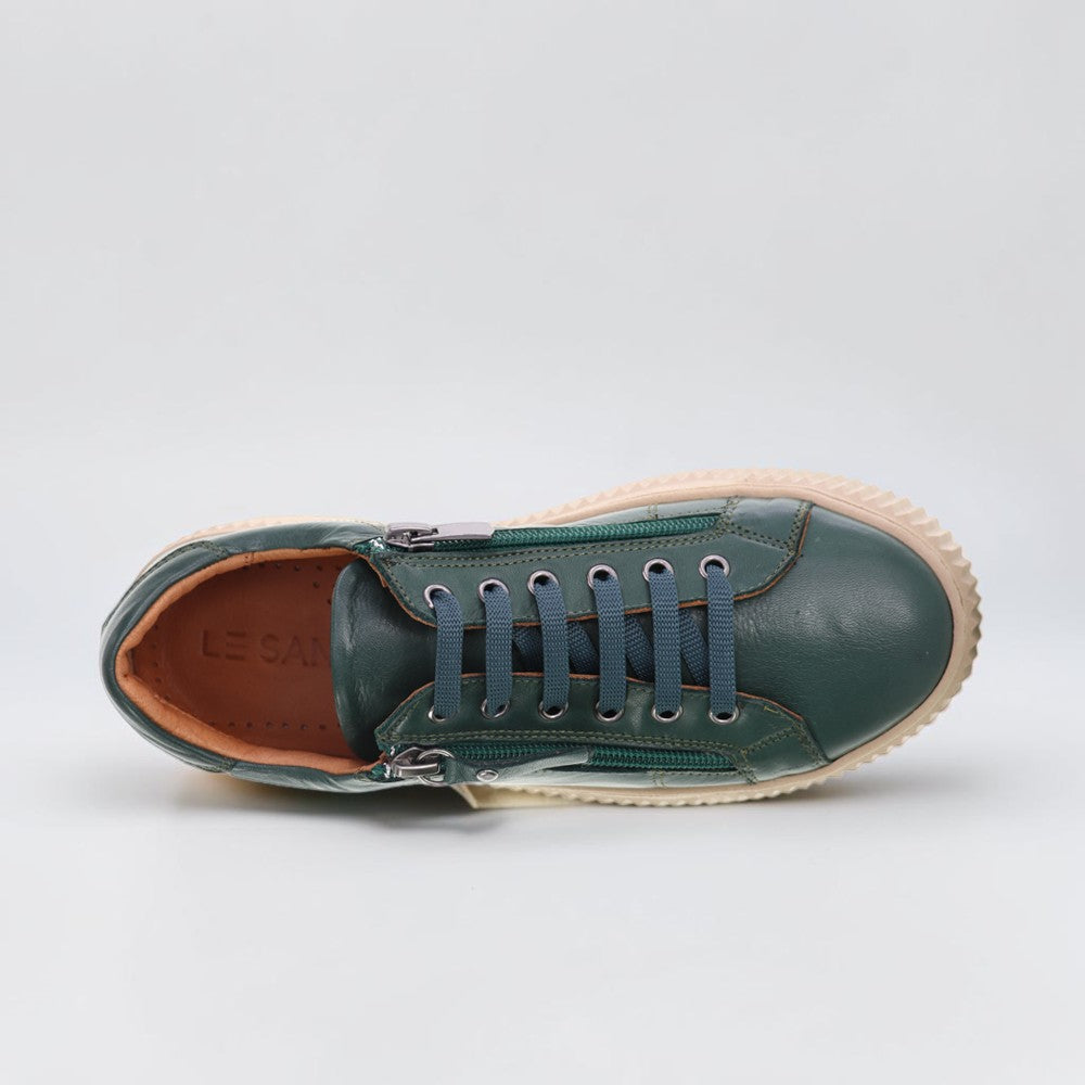 Le Sansa Palmer Olive sneakers featuring a sleek design with olive green colorway and stylish laces.