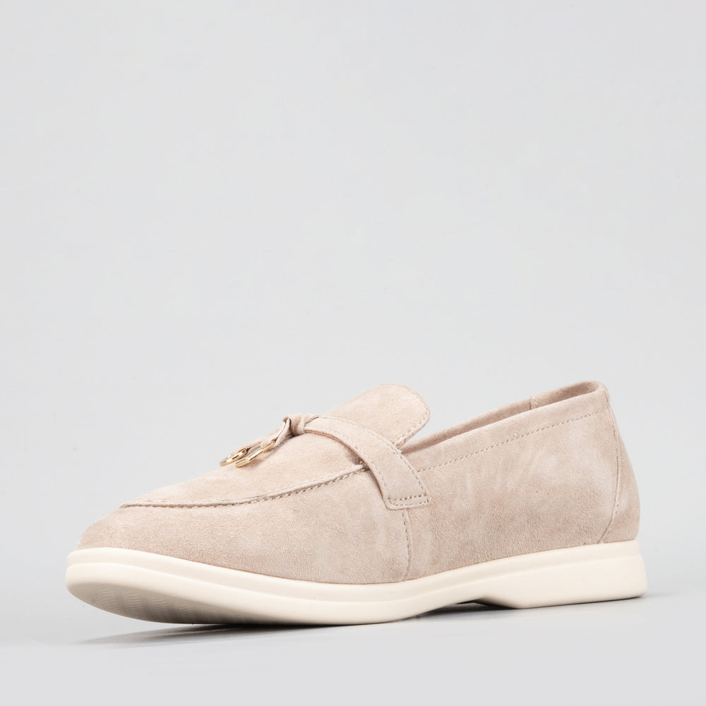 Le Sansa Capri Taupe suede loafers with a sleek slip-on design and rounded toe, stylish and comfortable footwear.