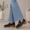 Black LE SANSA Zoey casual shoes with sleek design and comfortable fit, perfect for everyday wear.