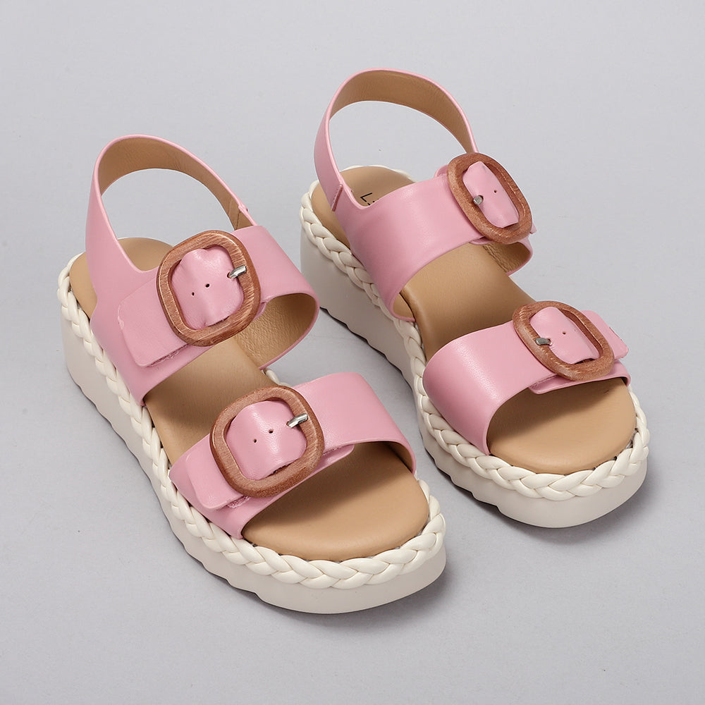 Le Sansa Emery baby pink sandals with cushioned straps and sole, perfect for comfortable and stylish little footwear.
