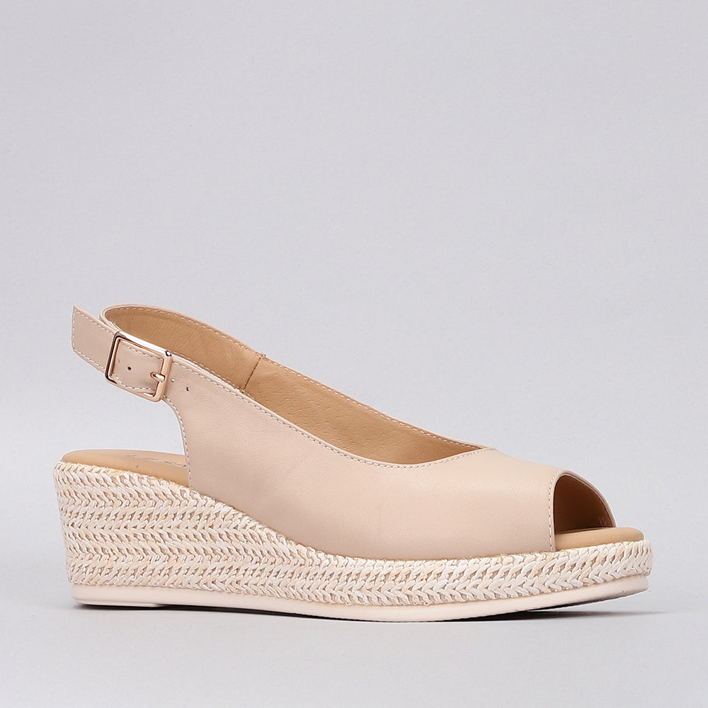 Le Sansa Petunia beige sandals with open toe design and ankle strap, stylish and comfortable footwear for warm weather.