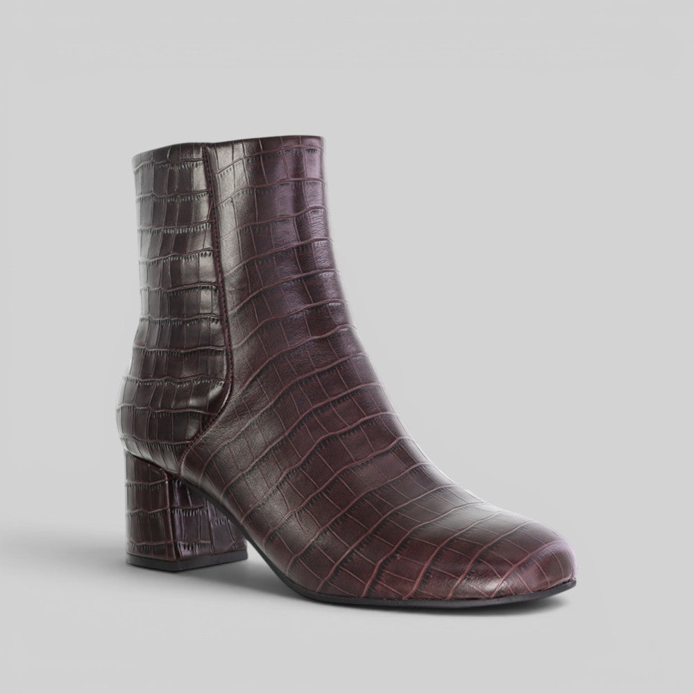 Le Sansa Rocket Chocolate Croc boots showing brown, textured croc leather design with chunky sole and ankle height.