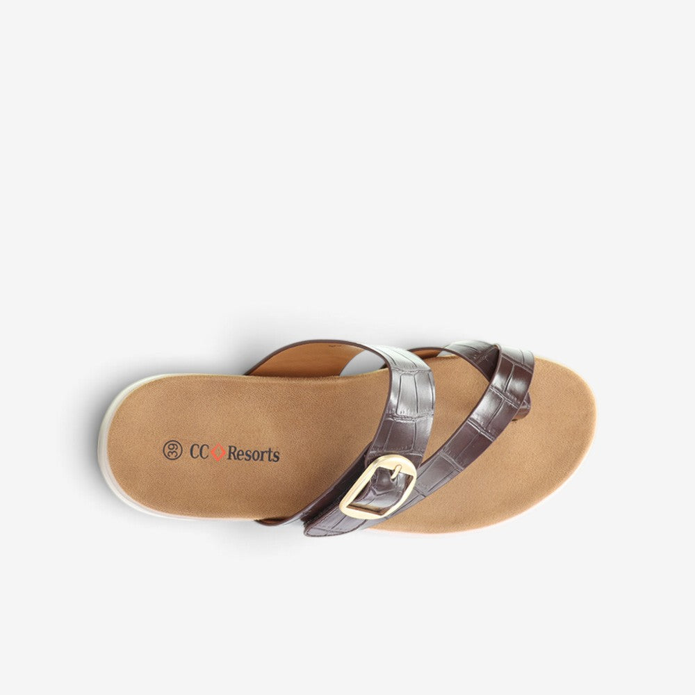 CC Resorts Domino Chocolate Crocs slip-on shoes featuring a sleek, chocolate-brown design and comfortable casual style.