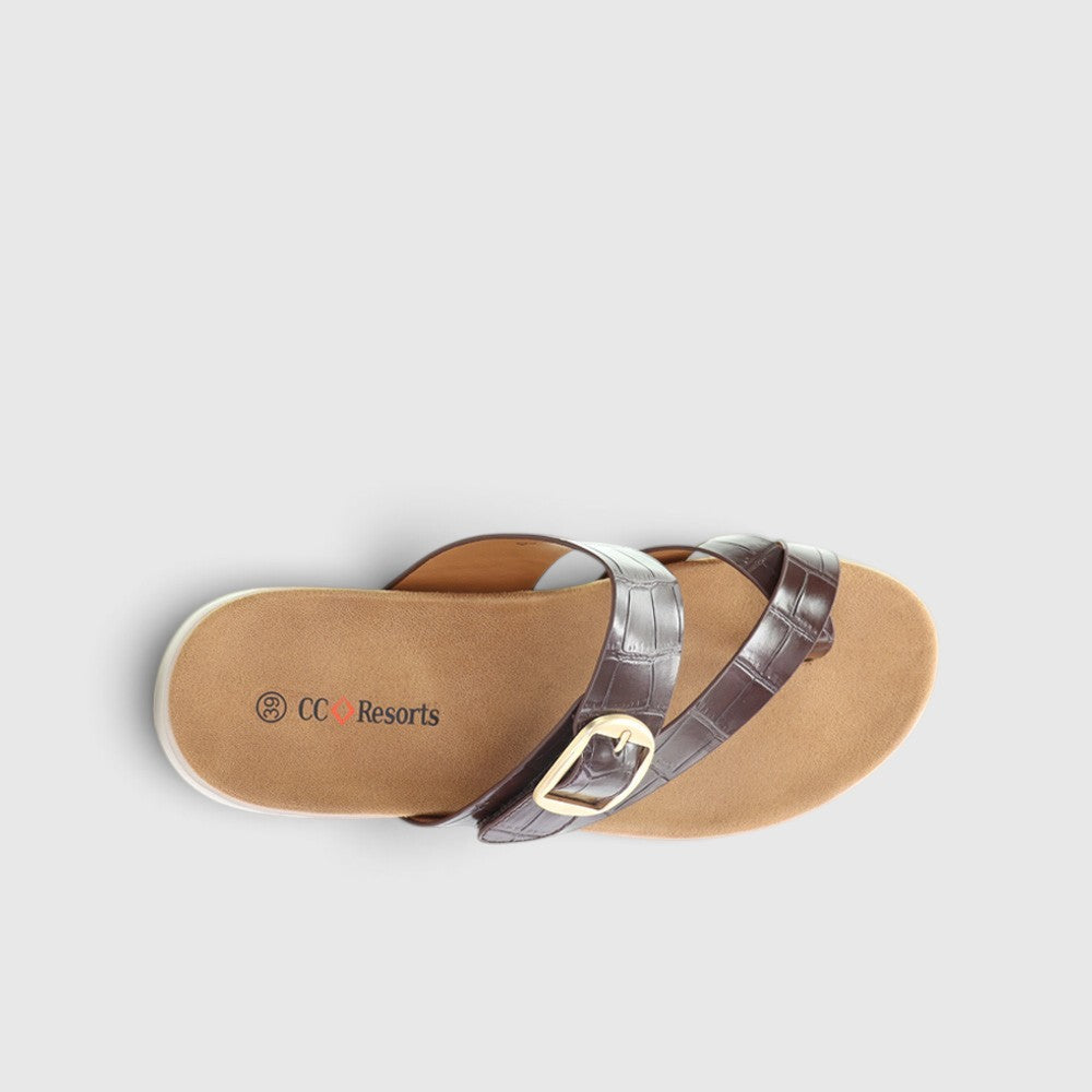 CC Resorts Domino Chocolate Crocs slip-ons featuring a sleek chocolate brown design and comfortable casual footwear.