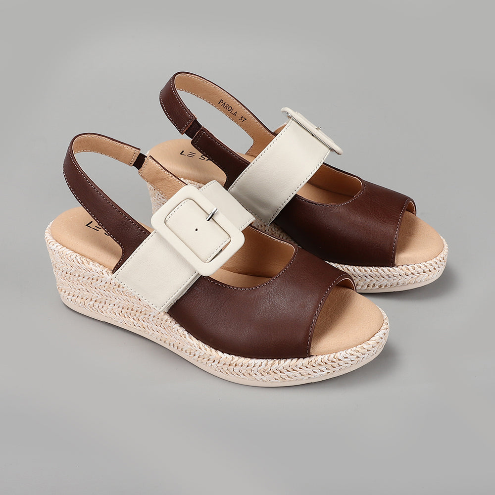 Le Sansa Sansa Parola Chocolate Cream sandals with open toe design and cushioned straps, stylish for casual wear.