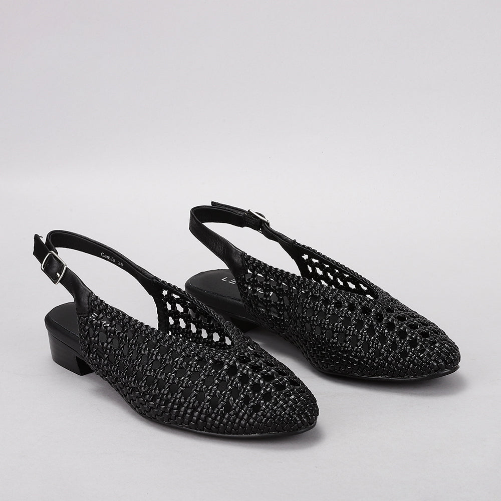 Le Sansa Camila black sandals with open toes and ankle straps, featuring a stylish and comfortable design.