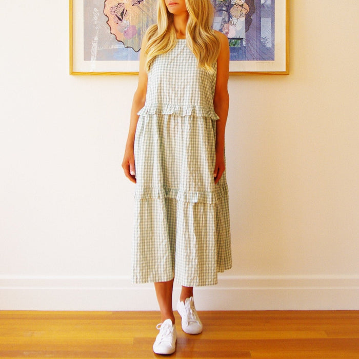 Who’s Charlie Rosie sleeveless granite green dress showing a casual, stylish dress with a relaxed fit and sleeveless design.