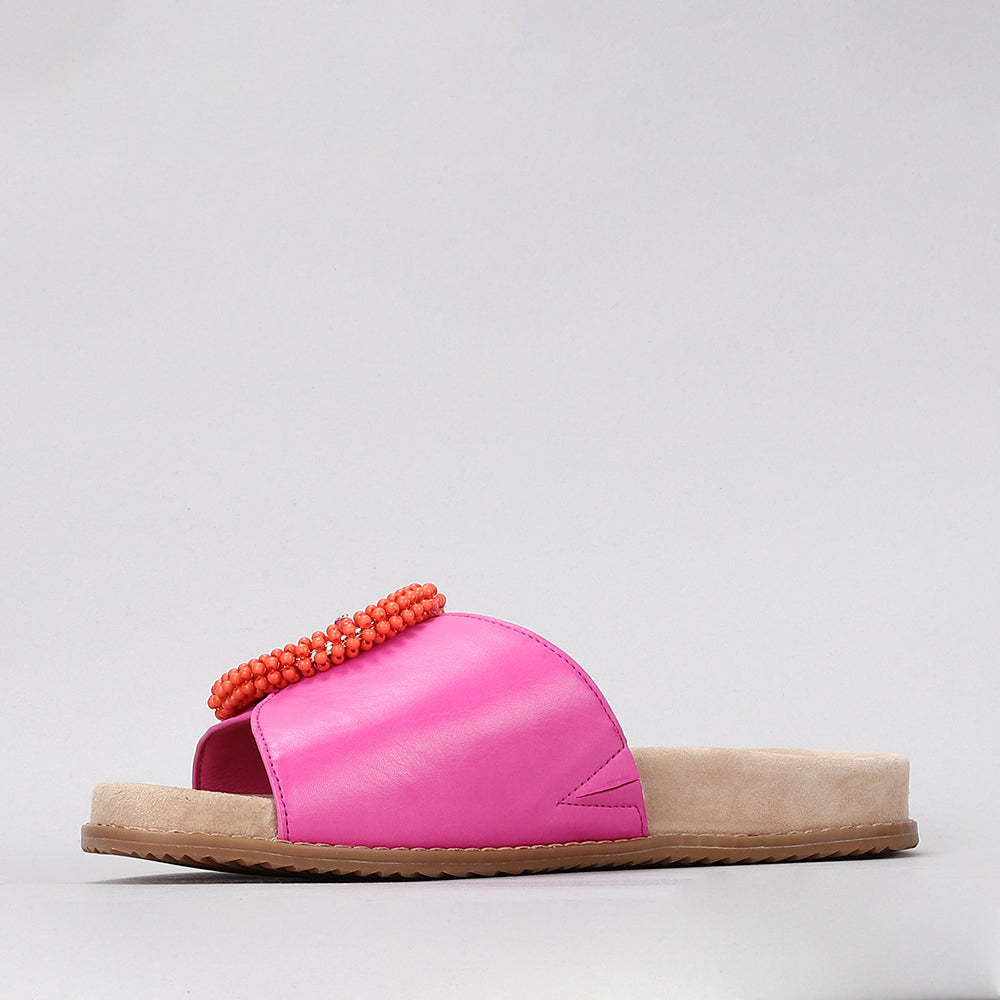 Naked Arches Zoya hot pink slip-on shoes with a sleek design and smooth fabric upper.
