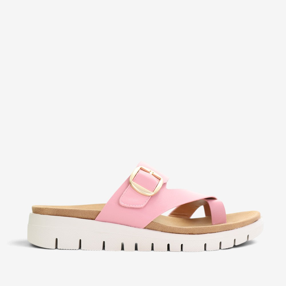 CC Resorts Domino slip-on shoes in baby pink, featuring a playful design and comfortable fit for casual wear.