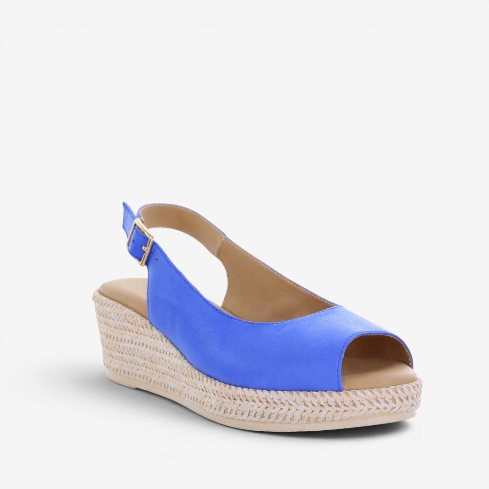 Le Sansa Petunia Royal Blue sandals with open toe and strap design, featuring vibrant blue color and comfortable casual style.