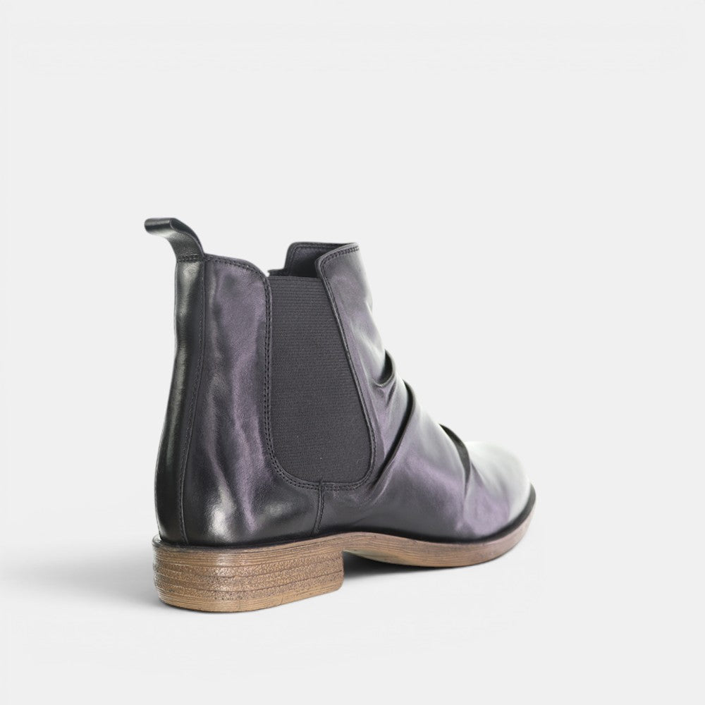 Black LE SANSA Lucy boots by Le Sansa, stylish ankle boots with a sleek design and pointed toe, perfect for fall and winter wear.