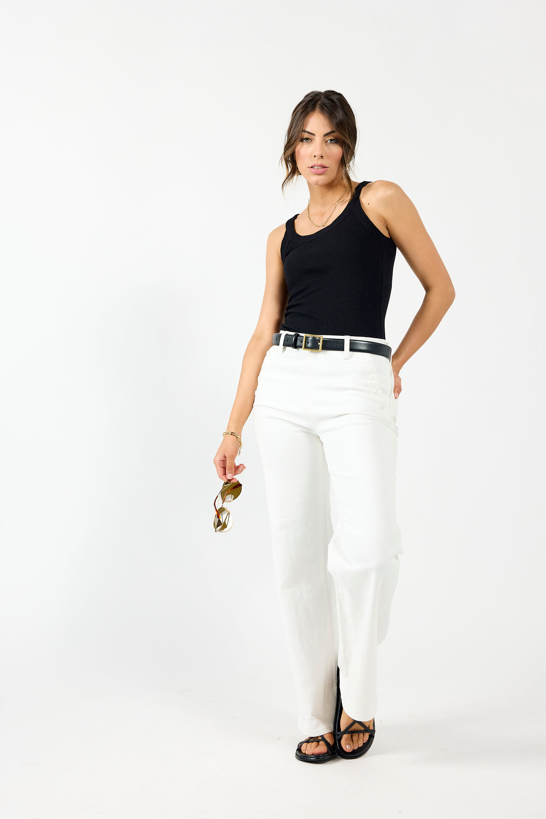 Off-white sailor-style jeans by Drama The Label featuring a relaxed fit and classic denim details.