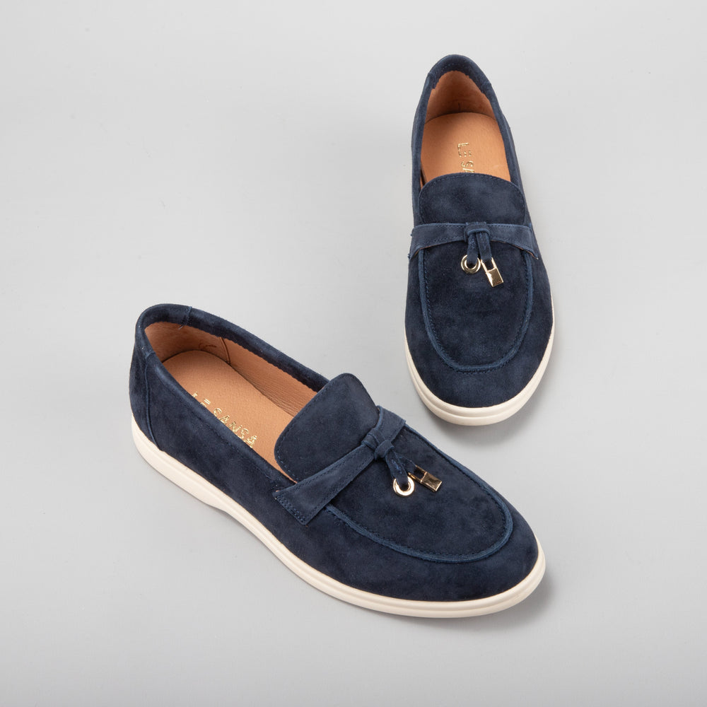 Le Sansa Capri navy suede loafers featuring a sleek design and comfortable slip-on style for casual and stylish wear.