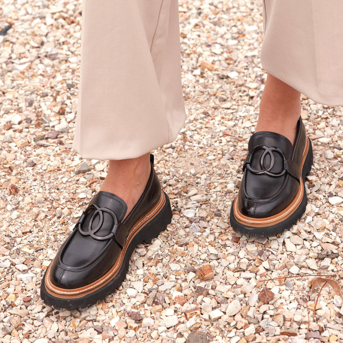 Eos ABBI Black loafers featuring sleek black leather design with rounded toes and low heels, stylish footwear for casual or formal wear.