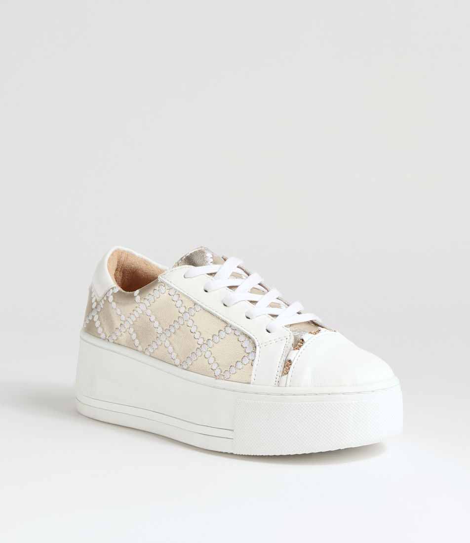 White gold sneakers from ALFIE & EVIE featuring stylish design and comfortable fit, shown on a plain background.