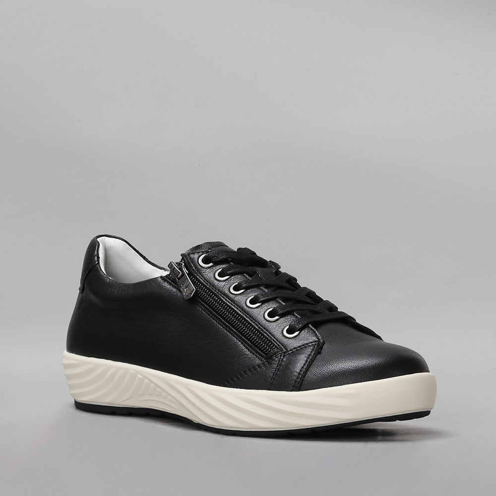 Black Naked Arches Ali sneakers with sleek design and textured sole, showcasing the stylish NAKED ARCHES branding.