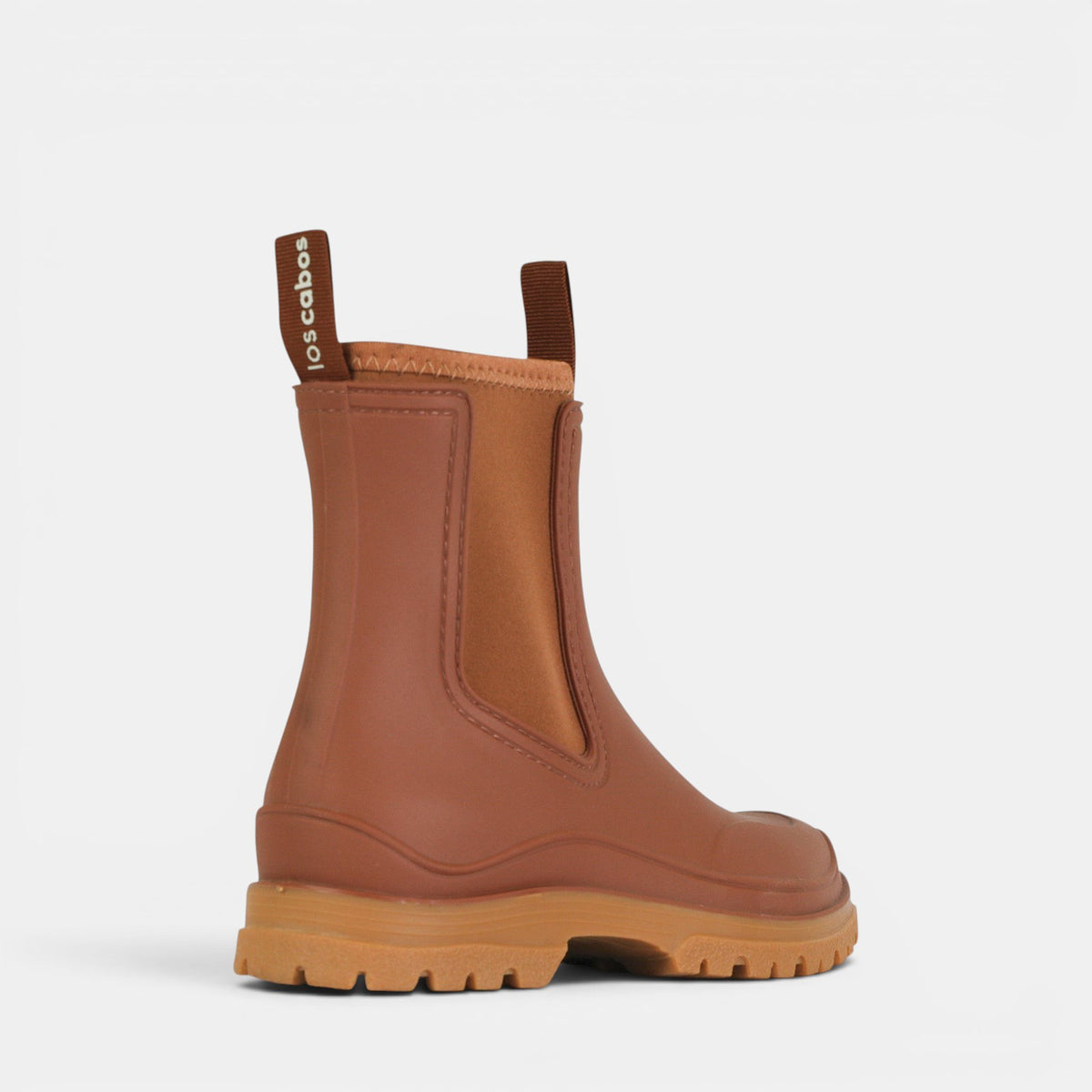 Pair of Los Cabos Amelia cinnamon boots in a rich chocolate color, featuring stylish design and ankle-high cut.