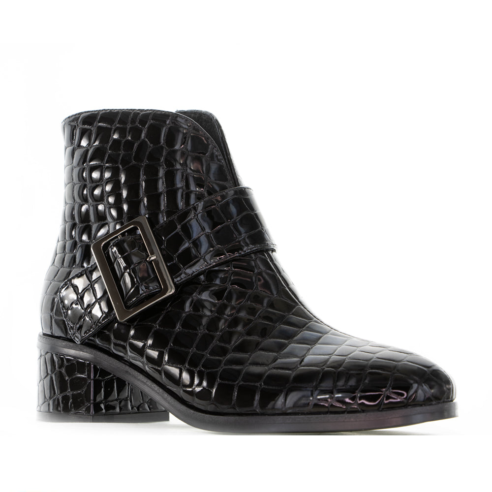 Le Sansa Andy black print boots with crocodile texture and lace-up design, stylish footwear for casual and trendy outfits.