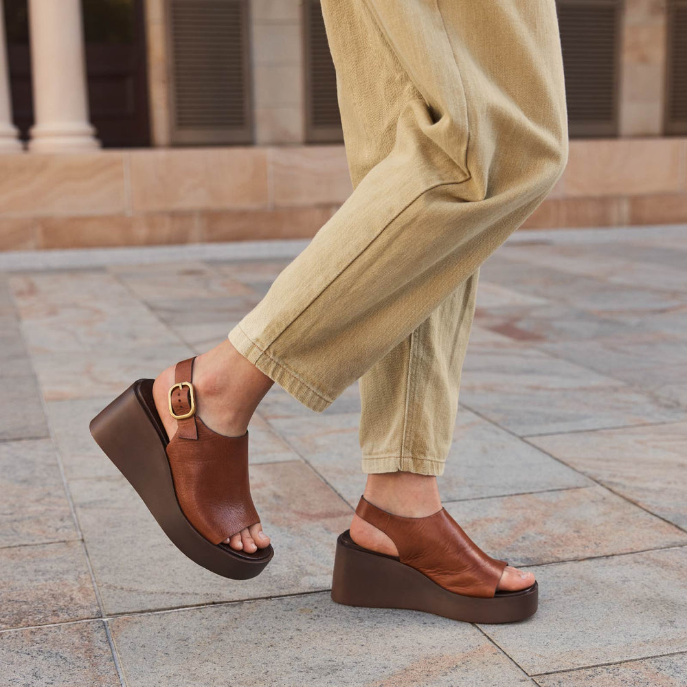 Eos Ariani Brandy sandals with tan leather straps and flat sole, stylish open-toe design for casual wear