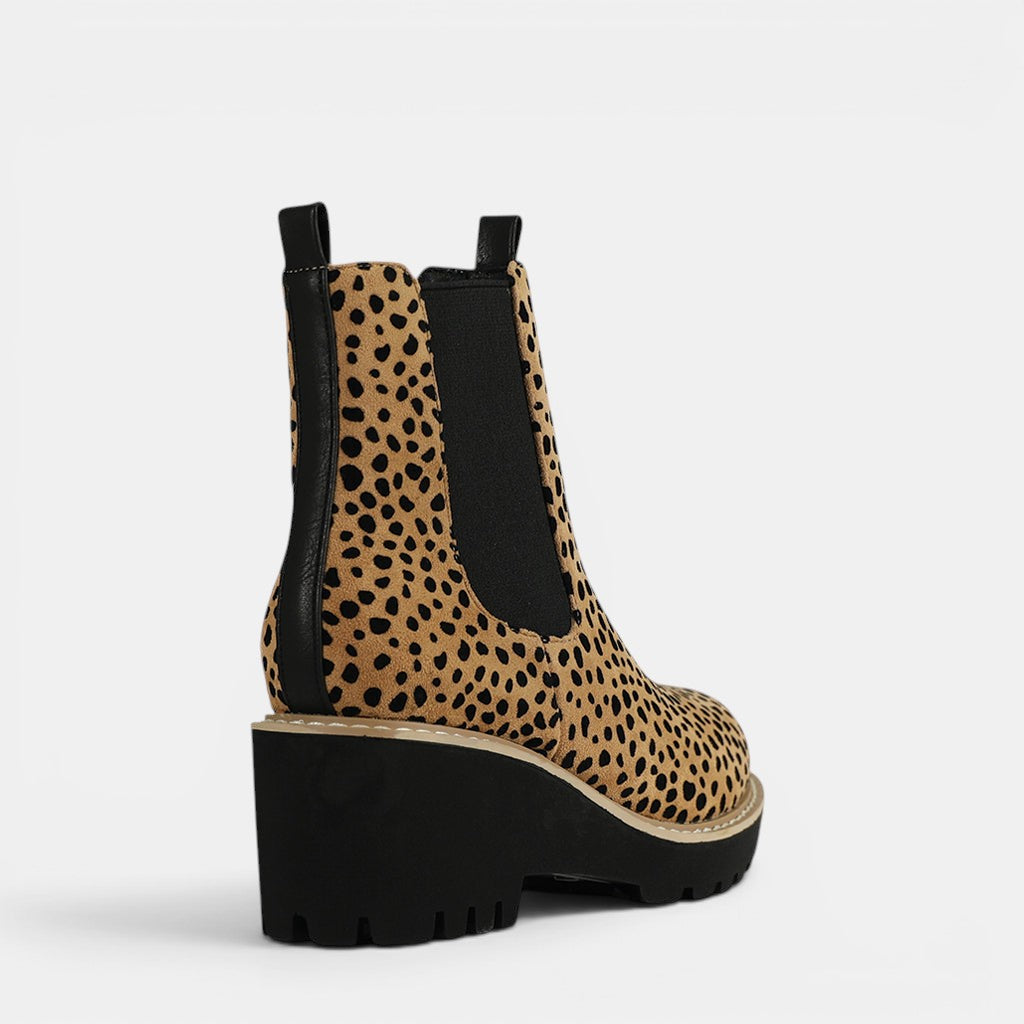 Los Cabos Ari Cheetah boots shown from back angle, featuring cheetah print leather and stylish ankle design.