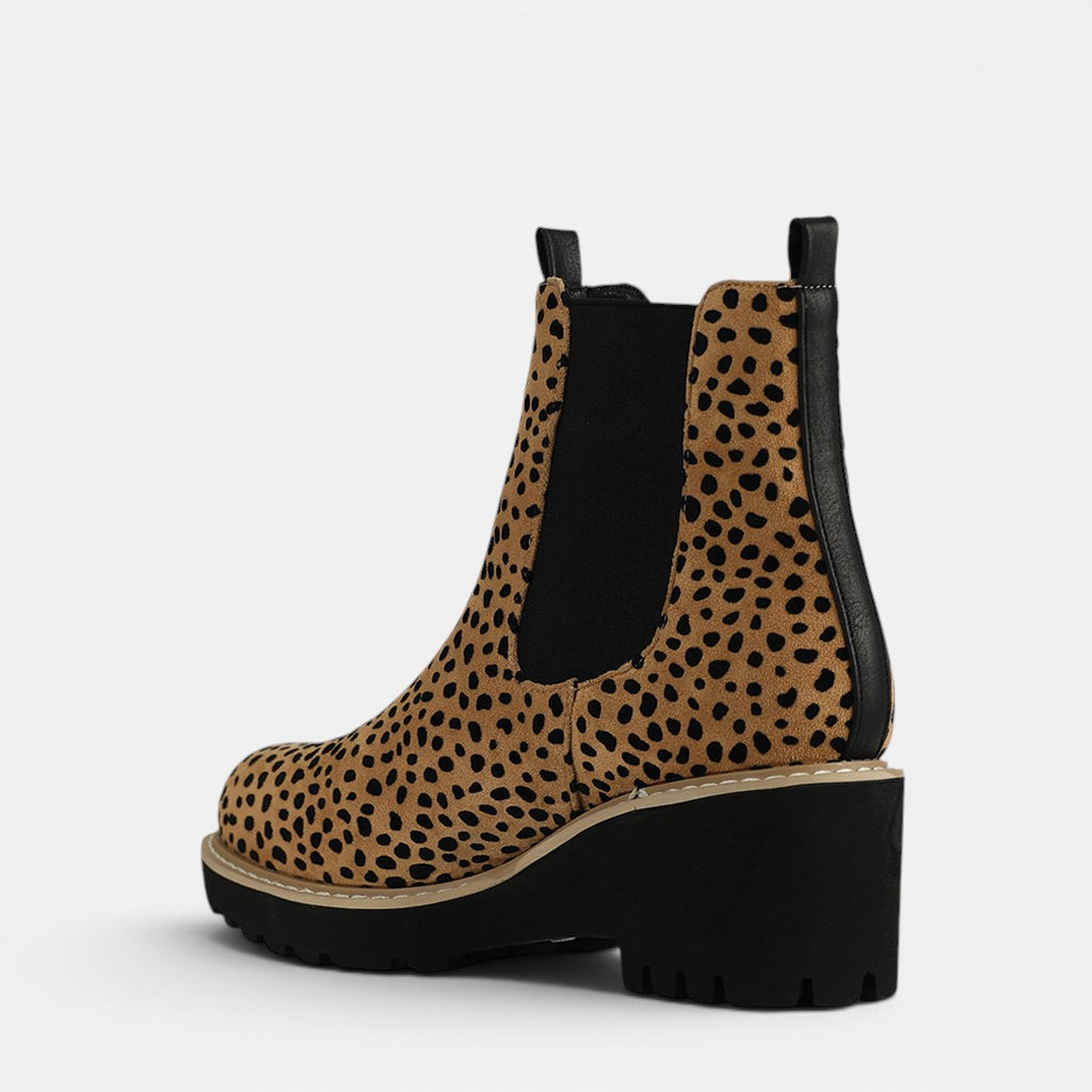 Los Cabos Ari Cheetah boots with animal print design, featuring pointed toes and ankle-high style.