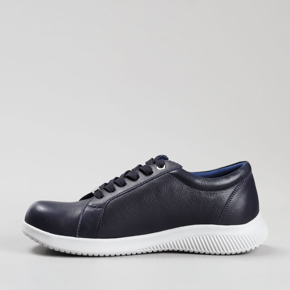 Naked Arches Avi Navy sneakers featuring navy blue and white athletic design with breathable mesh and supportive sole.