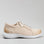 Naked Arches Avi Taupe sneakers showing side view with beige taupe color, breathable mesh upper, and casual athletic design.