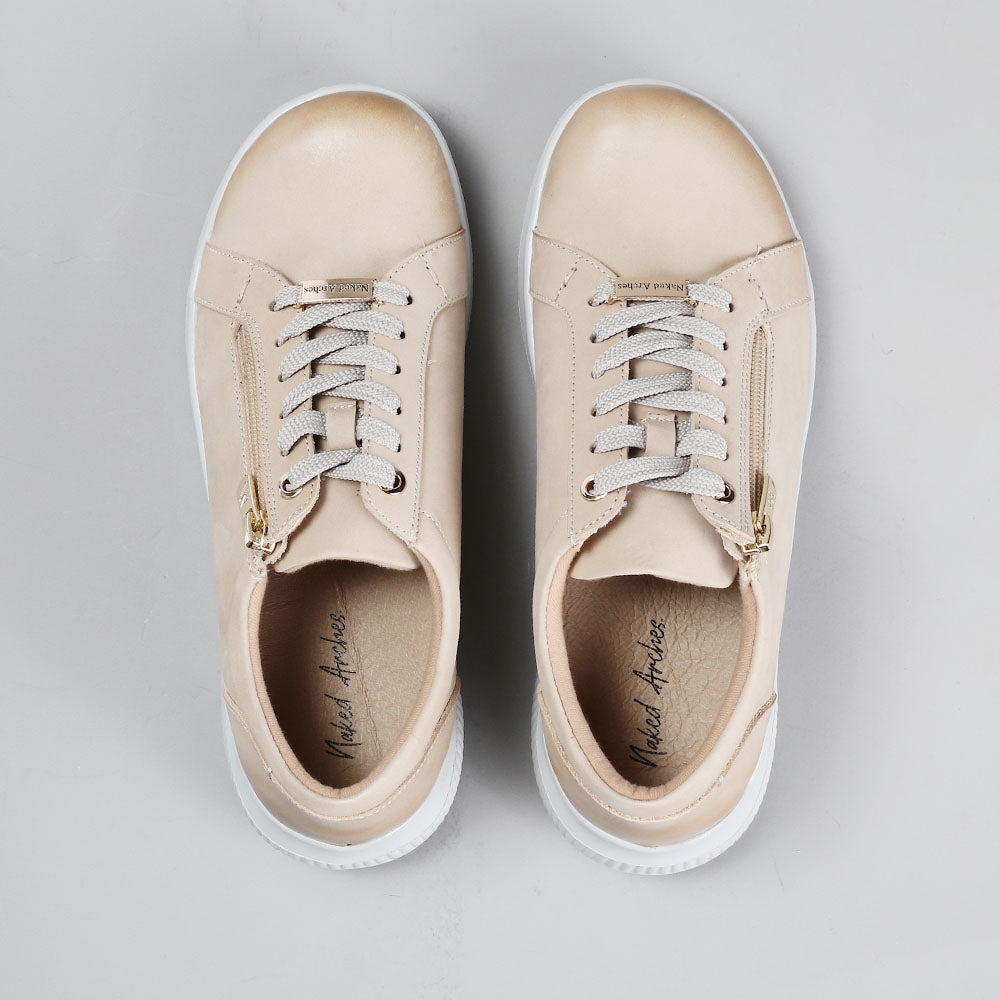 Naked Arches Avi Taupe sneakers with beige and taupe tones, featuring a sleek design and comfortable fit.