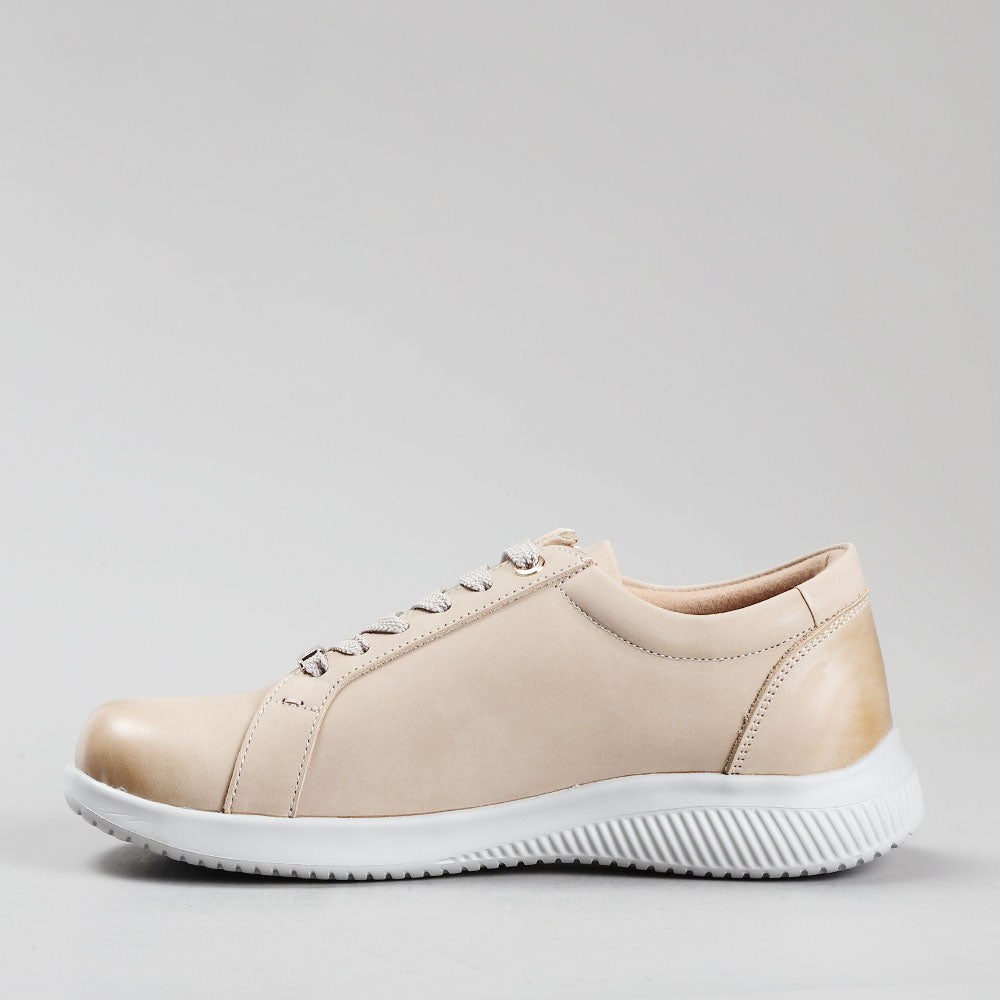 Naked Arches Avi Taupe sneakers featuring beige and taupe tones with a sleek, casual design and comfortable fit.