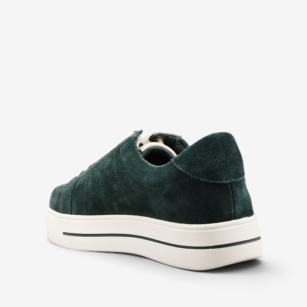 Naked Arches Azealia DK Green sneakers featuring a sleek design and green suede material, displayed on a white background.