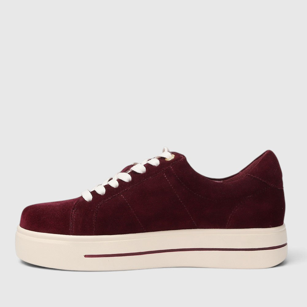 Naked Arches Azealia Burgundy sneakers featuring burgundy and white color blocking and stylish design.